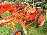 a model G, 11hp, with snowplow attachment