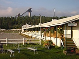 equestrian pavilion (where we sheltered)\nand ski jump towers